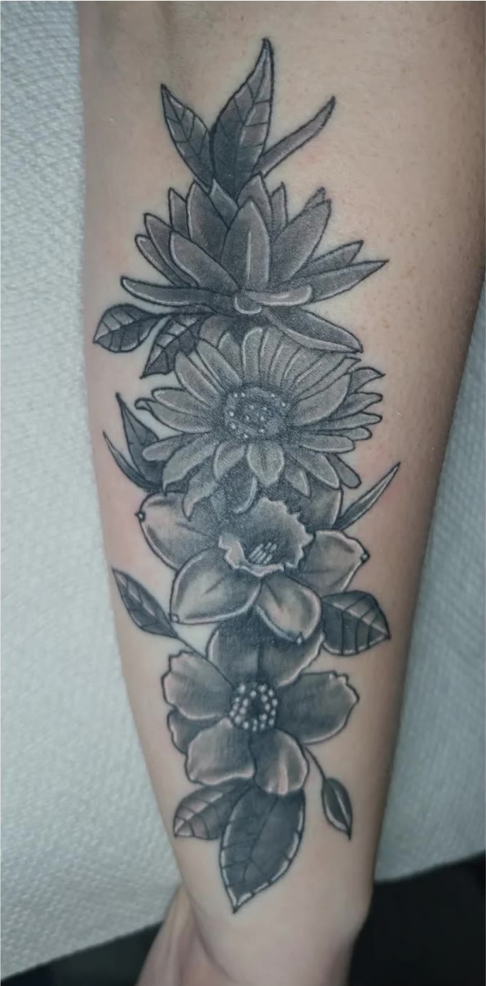 Finished floral cover-up on a forearm.